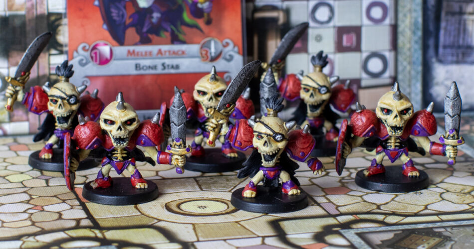 An army of painted skeleton miniatures.